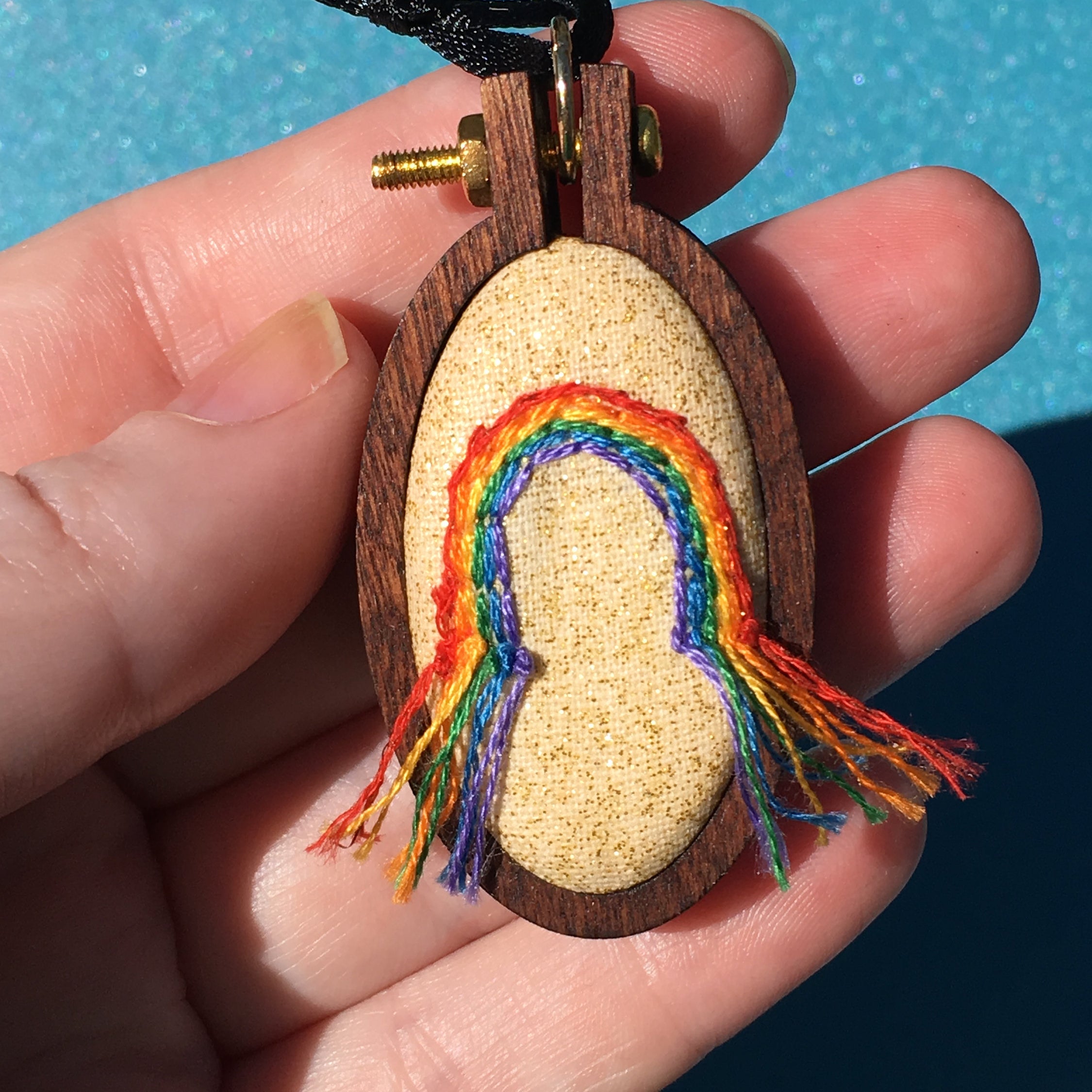 Miniature rainbow embroidery hoop pendant