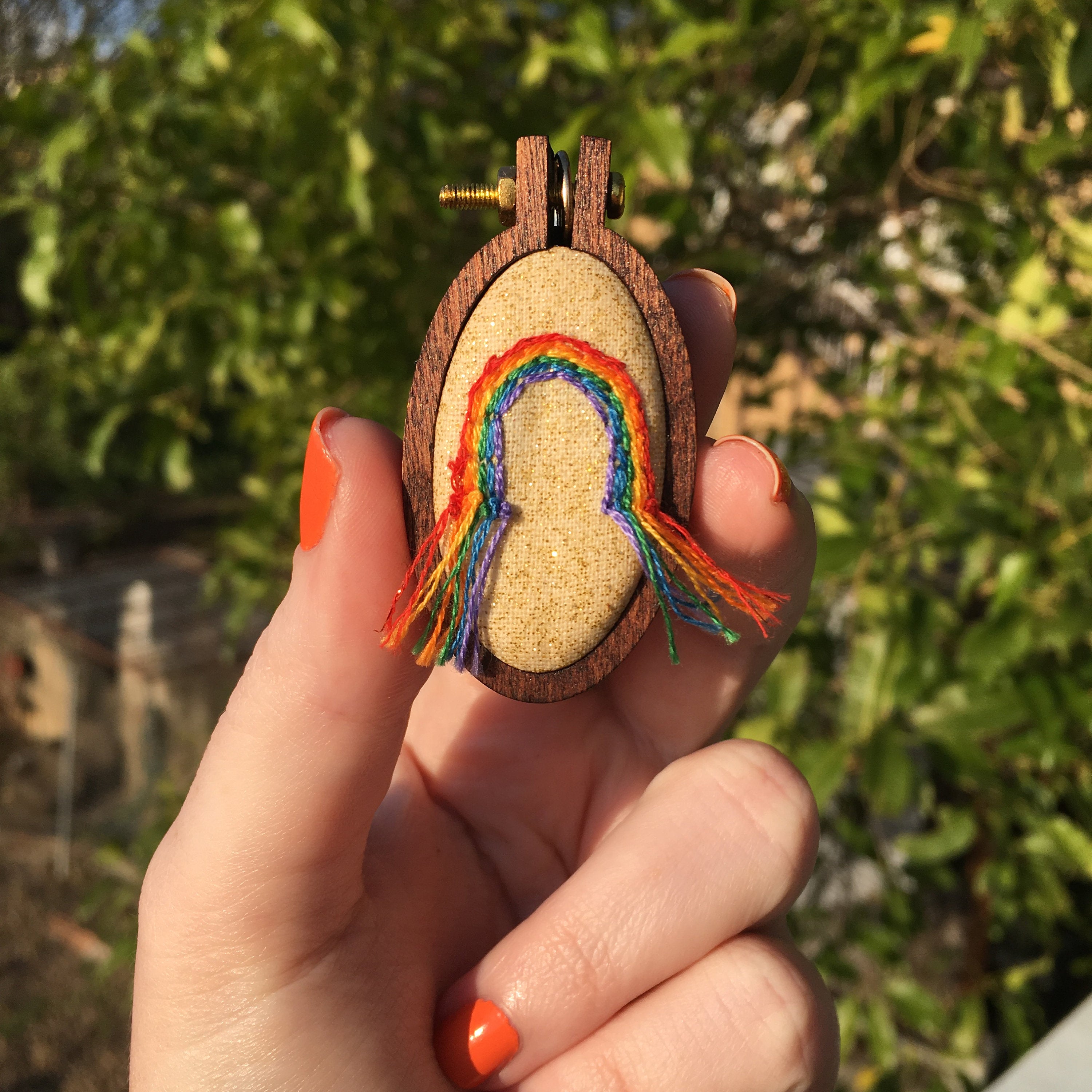 Miniature rainbow embroidery hoop pendant